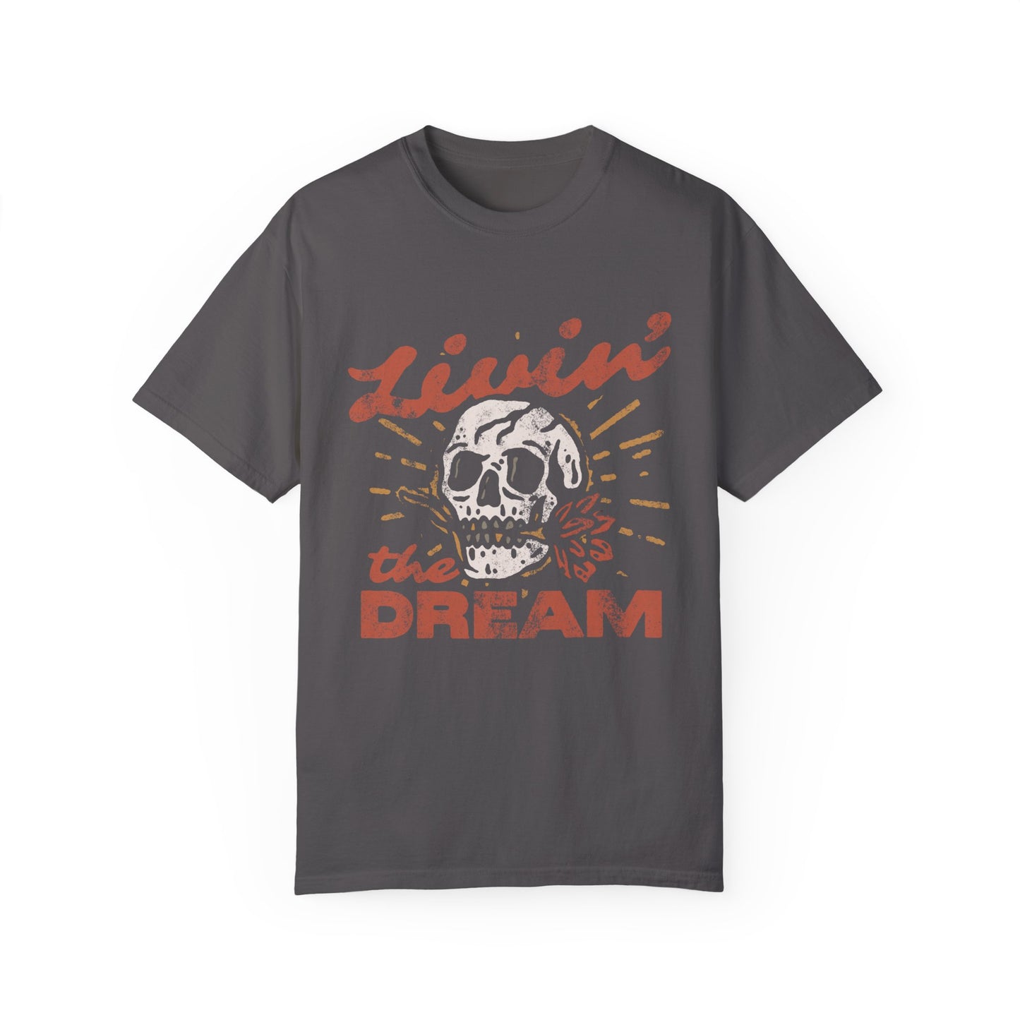 Black t-shirt with a vintage skull graphic, sunburst design, and 'Livin' the Dream' text in retro font. Perfect for a retro skull t-shirt or distressed skull tee look with a boho rocker vibe. Casual vintage t-shirt style for edgy everyday wear.