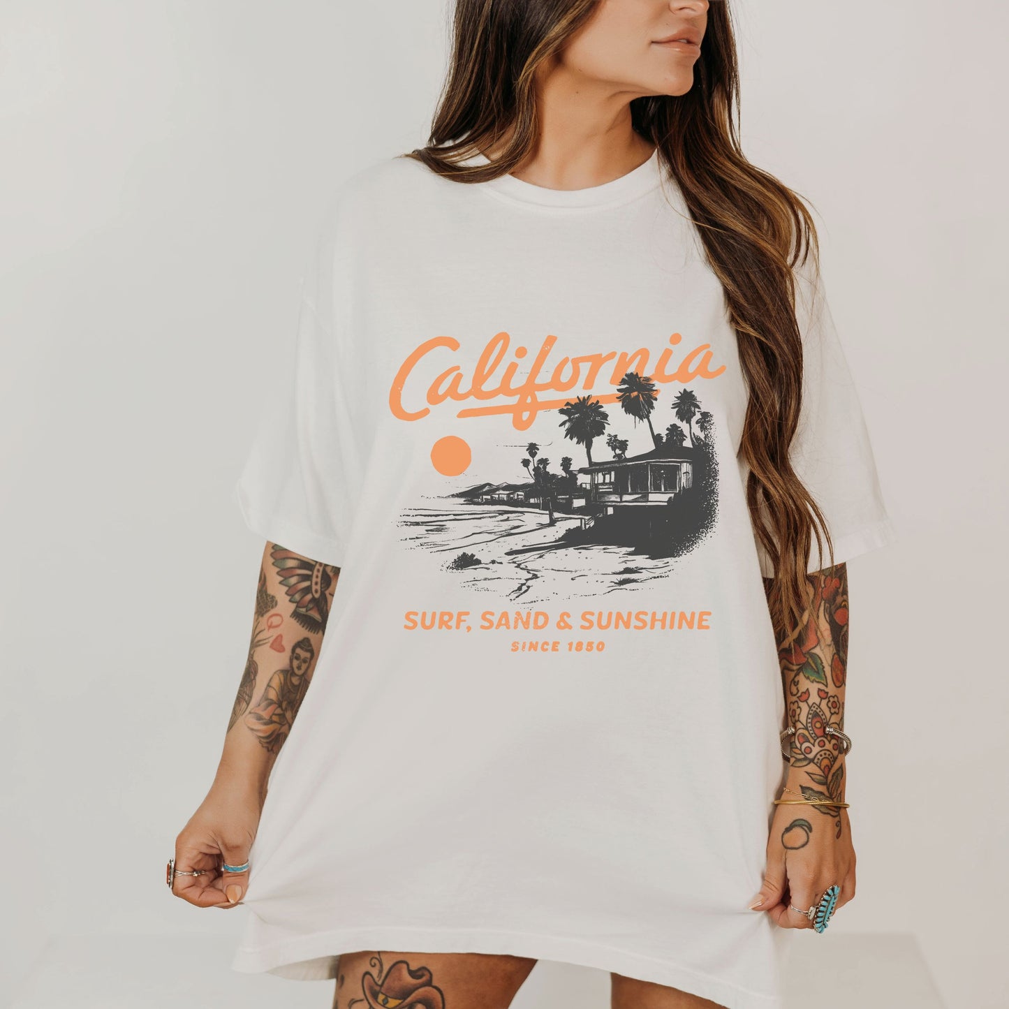 Retro California tee with vintage surf shirt design featuring a classic surf shack and palm trees. West Coast graphic tee for beach lovers. Lightweight surf tee with nostalgic style. California beach tee perfect for casual wear, old school surf tee for everyday comfort.