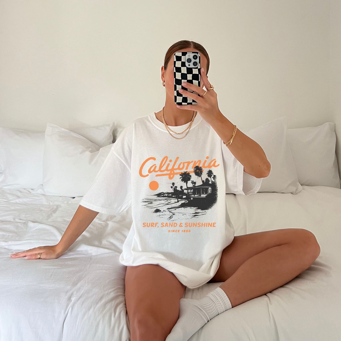 Retro California tee with vintage surf shirt design featuring a classic surf shack and palm trees. West Coast graphic tee for beach lovers. Lightweight surf tee with nostalgic style. California beach tee perfect for casual wear, old school surf tee for everyday comfort.