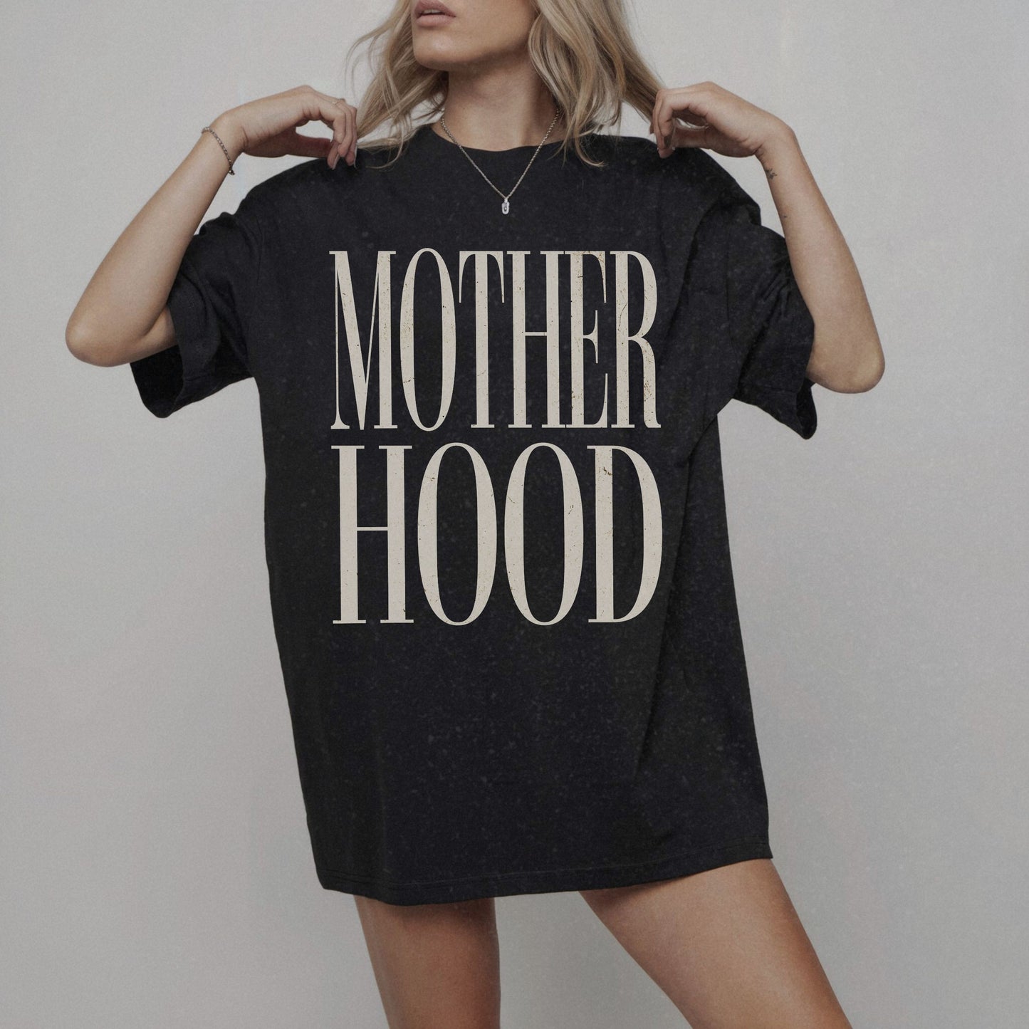 Minimalist Mom Tee with bold graphic design and relaxed fit. Modern Mom T-Shirt perfect for everyday wear. Chic Oversized Tee for stylish moms. Statement Mom Tee with comfy feel, great for mom life outfits, casual looks, and motherhood style.