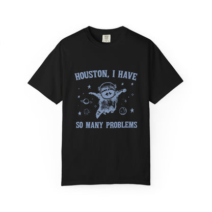 Black t-shirt with white graphic and text 'Houston, I have so many problems' on a white background