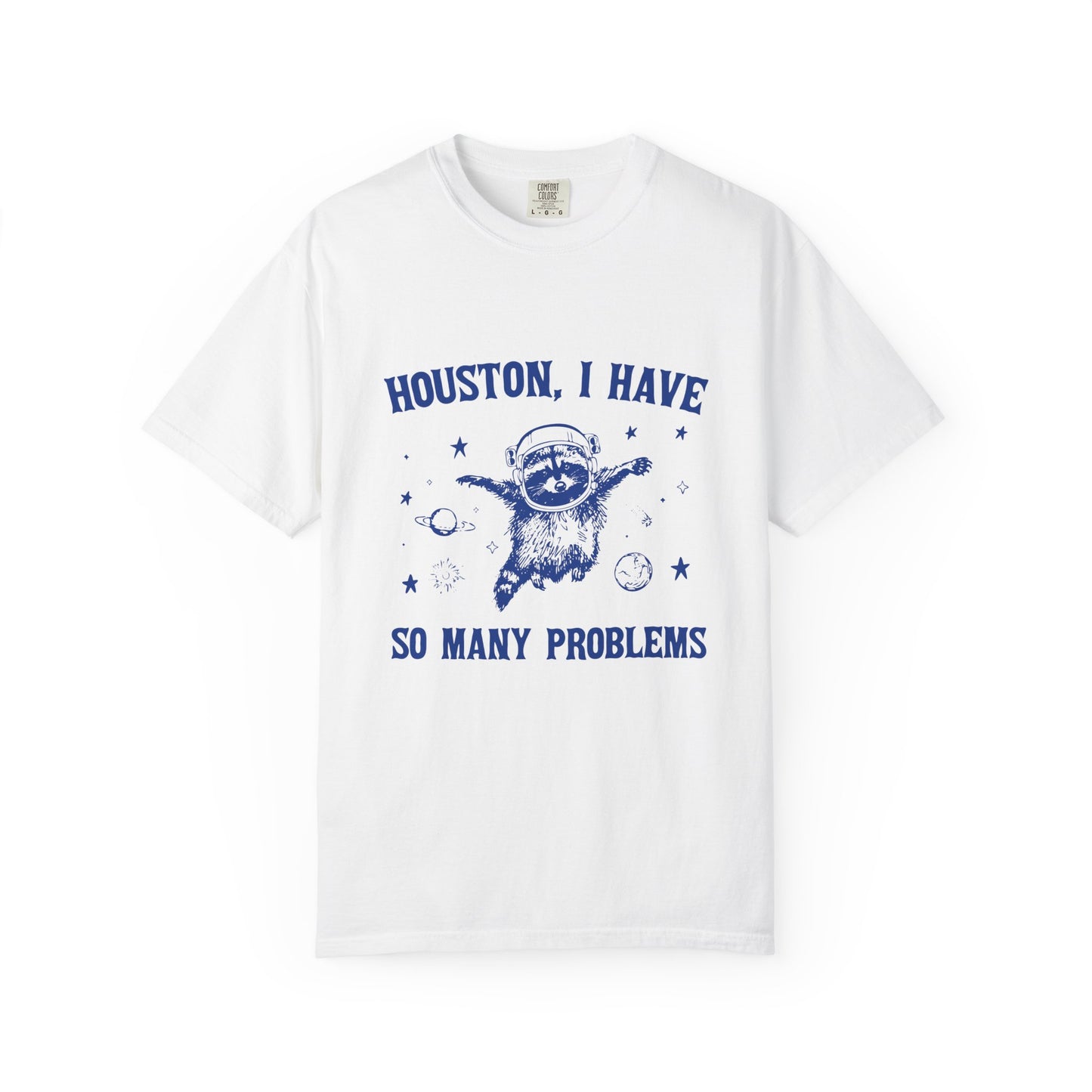 White t-shirt with blue graphic and text 'Houston, I have so many problems' on a white background