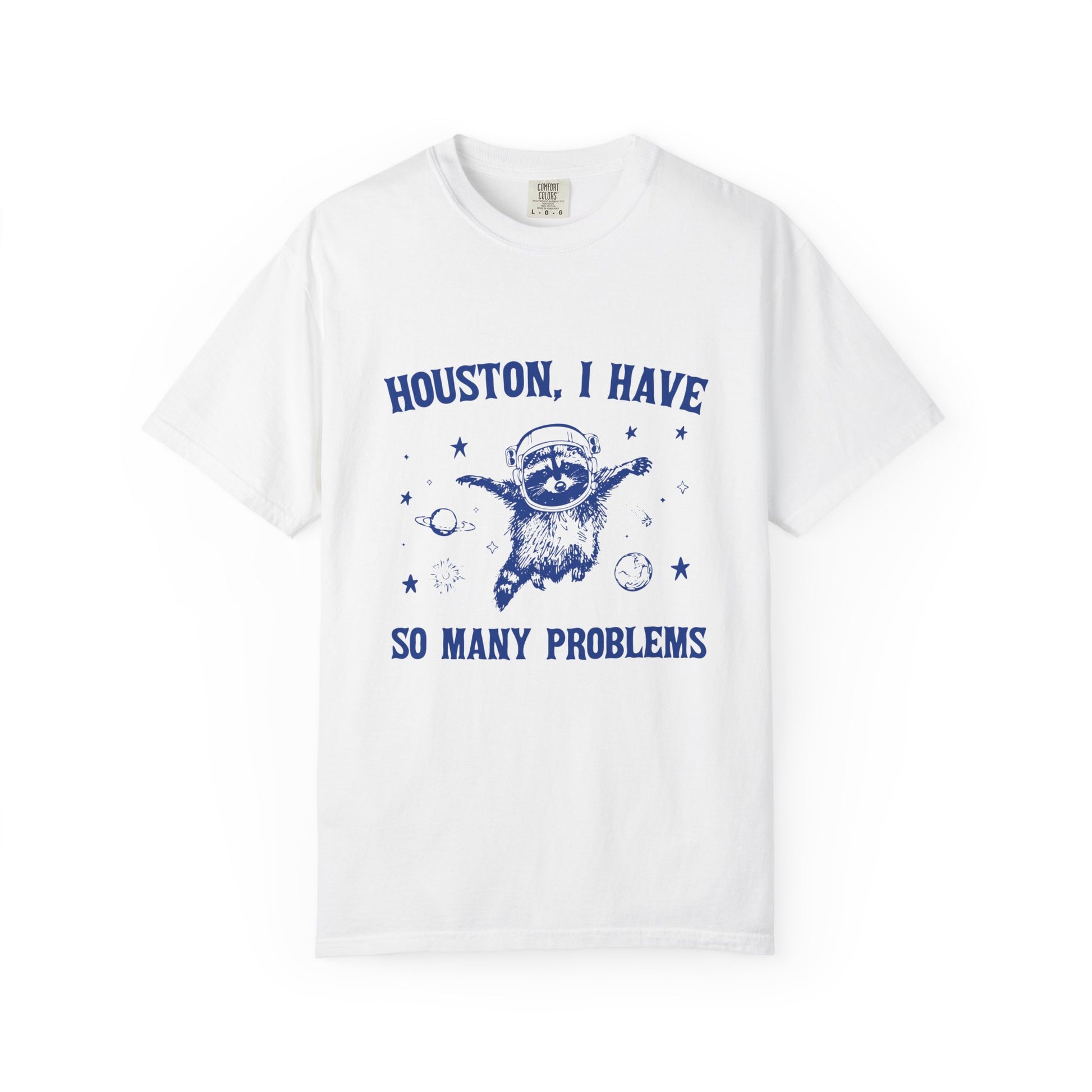 White t-shirt with blue graphic and text 'Houston, I have so many problems' on a white background