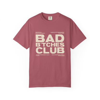 Mauve t-shirt with 'Bad Bitches Club' text on a white background