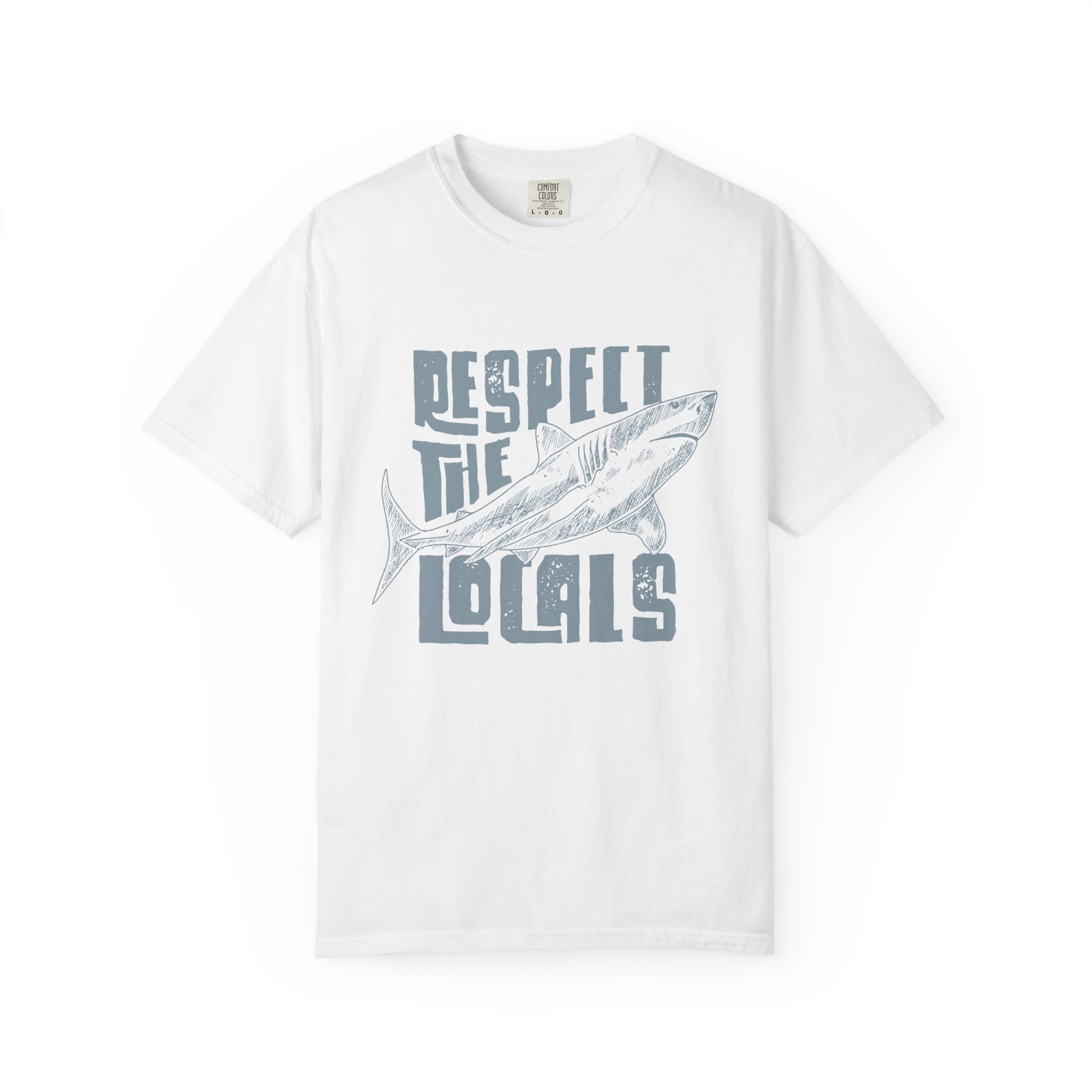 White t-shirt with a graphic of a fish and text 'Respect the Locals' on a white background