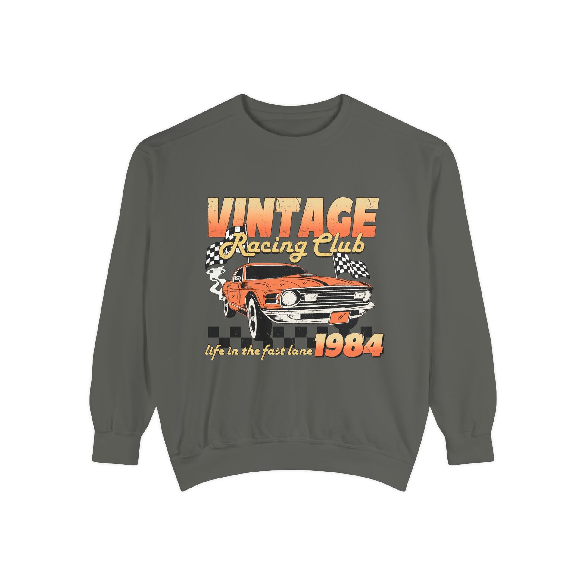 Retro car club shirt with vintage 1984 race car graphic, distressed design, and checkered flag accents. Perfect for muscle car lovers and fans of classic racing. Available as a crewneck sweatshirt in multiple colors.