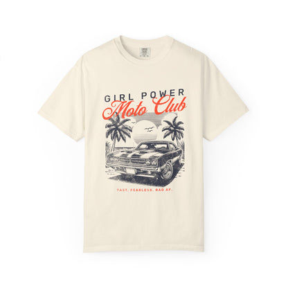 Beige t-shirt with 'Girl Power Moto Club' graphic design featuring a car and palm trees on a white background.