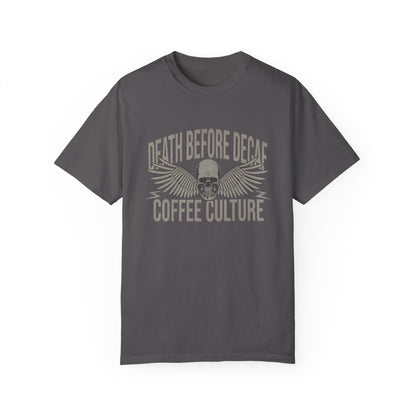 T-shirt with bold Death Before Decaf design featuring a skull and wings. Perfect for coffee lovers who prefer strong brews. This edgy coffee skull shirt makes a great caffeine addict tee or anti decaf shirt. Fits unisex style and works as a vintage coffee tee, goth coffee shirt, or strong coffee shirt. Ideal for casual wear, gifting, or making a bold coffee culture statement. Funny coffee shirt with attitude.