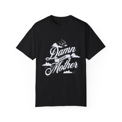 T-shirt with "Damn Good Mother" design in vintage tattoo style. Retro mama t shirt with bold mom statement and bird illustrations. Cool mom graphic tee perfect for Mother’s Day gift or everyday wear. Trendy mom gift tee with edgy mom tee shirt vibes. Stylish mom shirt for confident, fun-loving mamas. Unique cute mom saying tee with rad mama energy. Tattoo style mom tee that makes the perfect bold mom statement piece.