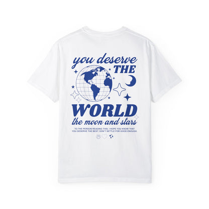 Motivational graphic t-shirt with a celestial design featuring stars, moon, and globe. Includes the inspiring phrase 'you deserve the world.' A trendy and stylish vintage-inspired tee for casual wear, perfect for spreading positivity and empowerment.
