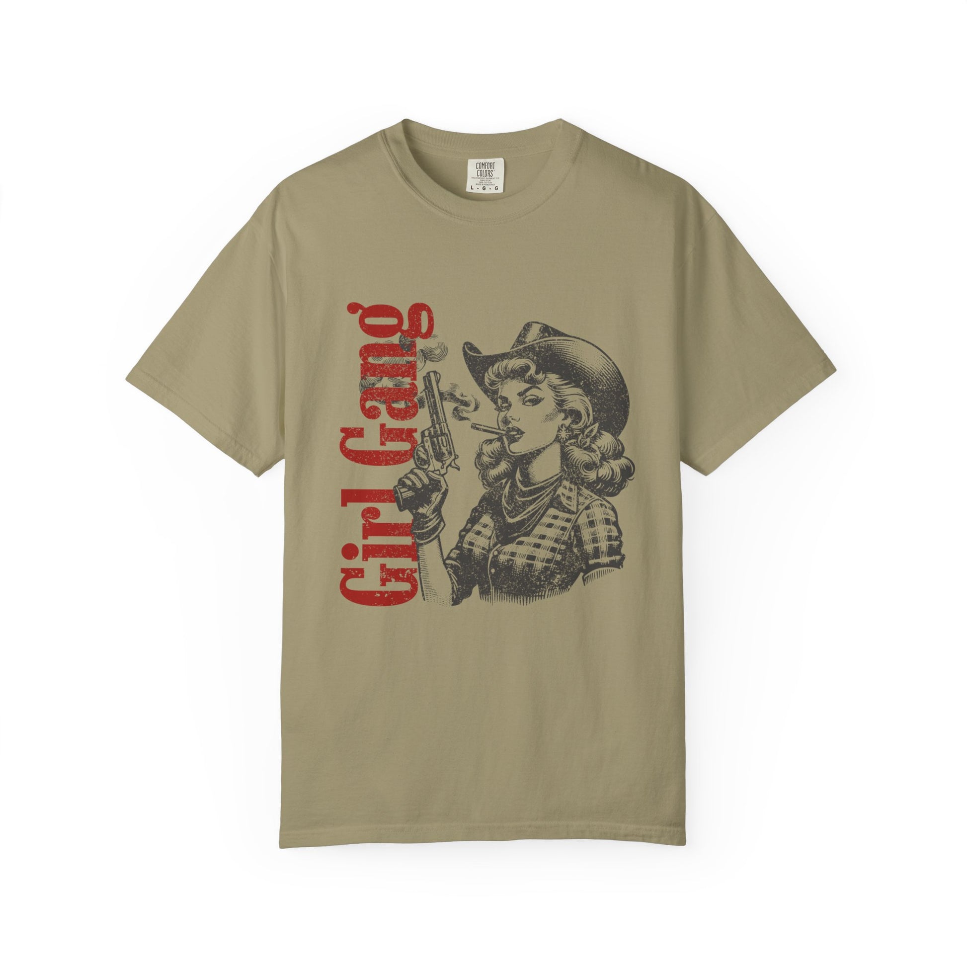 Beige t-shirt with graphic design of a woman in a cowboy hat and 'Girl Gang' text on a white background
