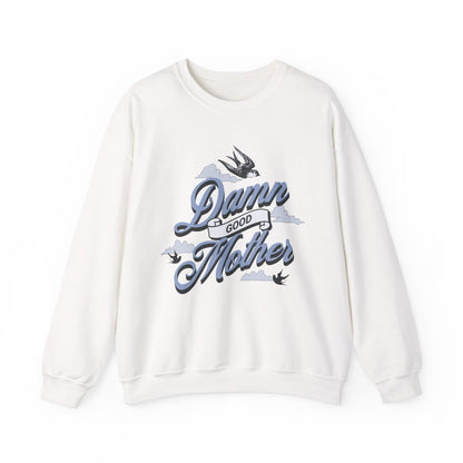 Crewneck sweatshirt with “Damn Good Mother” graphic in tattoo style. Cool mom sweatshirt with vintage and retro mama sweater vibe. Bold mom pullover for edgy, confident women. Funny mom jumper and trendy mom sweater perfect for gifting or everyday wear. Stylish mama crew with rad mom graphic top. Great for Mother's Day crewneck gift or casual looks. Cute mom sweatshirt with bold statement and timeless design.