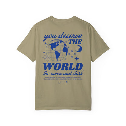 Motivational graphic t-shirt with a celestial design featuring stars, moon, and globe. Includes the inspiring phrase 'you deserve the world.' A trendy and stylish vintage-inspired tee for casual wear, perfect for spreading positivity and empowerment.