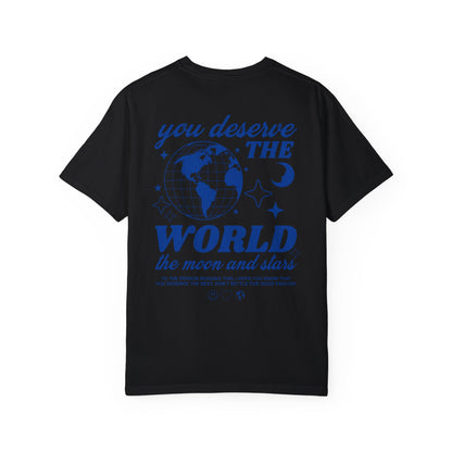 Motivational graphic t-shirt with a celestial design featuring stars, moon, and globe. Includes the inspiring phrase 'you deserve the world.' A trendy and stylish vintage-inspired tee for casual wear, perfect for spreading positivity and empowerment.