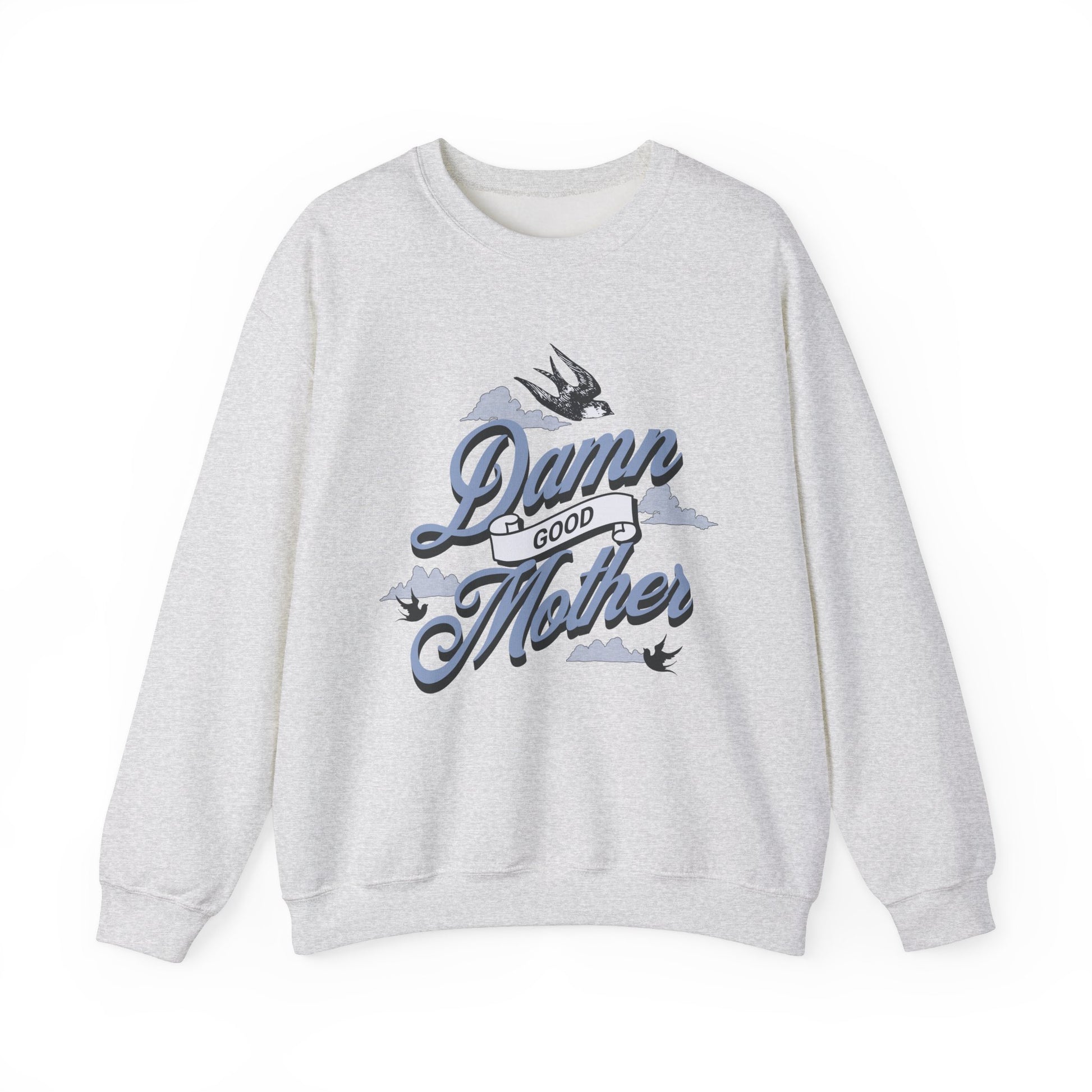 Crewneck sweatshirt with “Damn Good Mother” graphic in tattoo style. Cool mom sweatshirt with vintage and retro mama sweater vibe. Bold mom pullover for edgy, confident women. Funny mom jumper and trendy mom sweater perfect for gifting or everyday wear. Stylish mama crew with rad mom graphic top. Great for Mother's Day crewneck gift or casual looks. Cute mom sweatshirt with bold statement and timeless design.