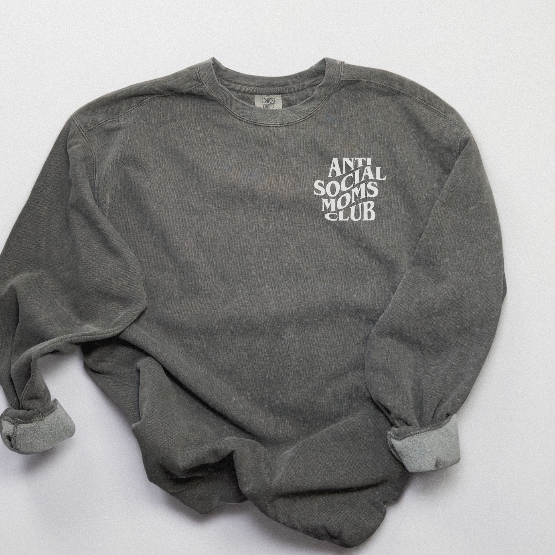 Anti Social Moms Club sweatshirt with bold graphic text on the back. Perfect funny mom sweatshirt or vintage mom pullover for casual wear. Stylish, oversized fit for a comfy mom sweatshirt, ideal gift for moms who love humor and relaxed style.