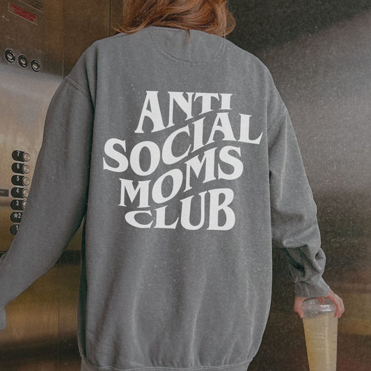 Anti Social Moms Club sweatshirt with bold graphic text on the back. Perfect funny mom sweatshirt or vintage mom pullover for casual wear. Stylish, oversized fit for a comfy mom sweatshirt, ideal gift for moms who love humor and relaxed style.