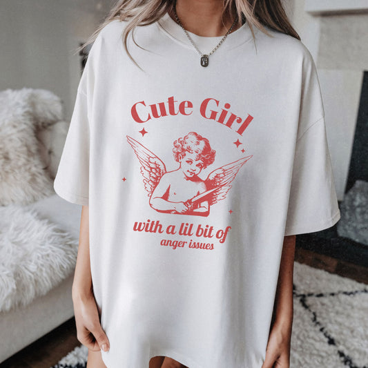 Vintage angel shirt with sassy angel print featuring a cute girl angel graphic. Oversized angel tee with retro vibes. Aesthetic angel shirt for casual looks. Funny retro angel tee with whimsical design. Unique angel tee for bold, stylish outfits.