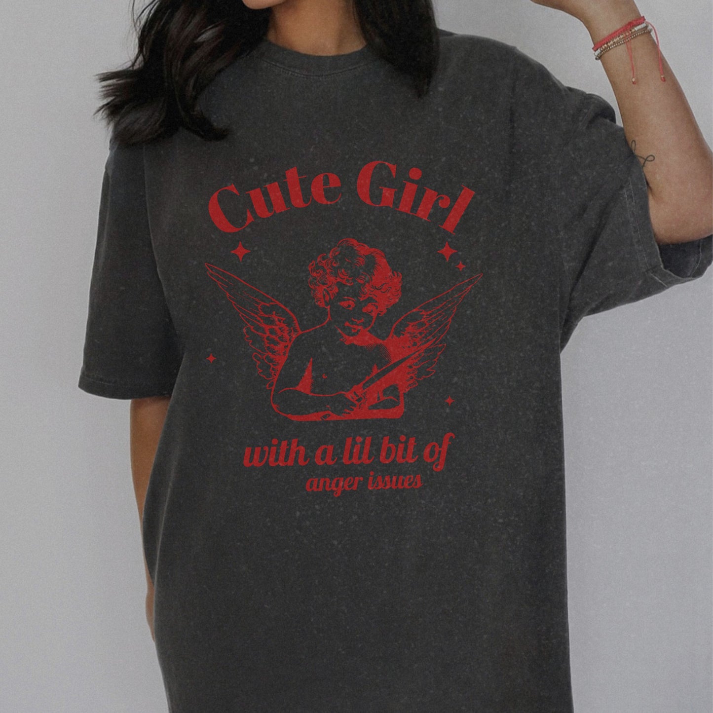 Vintage angel shirt with sassy angel print featuring a cute girl angel graphic. Oversized angel tee with retro vibes. Aesthetic angel shirt for casual looks. Funny retro angel tee with whimsical design. Unique angel tee for bold, stylish outfits.