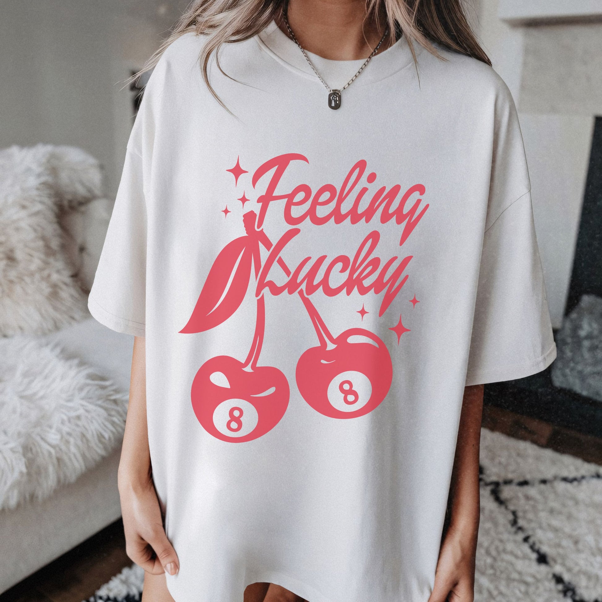 Shirt featuring a lucky cherry graphic with vintage red cherries and an 8-ball design. Retro cherry t-shirt with a feeling lucky vibe, perfect as a black vintage shirt or fun vintage shirt for casual, stylish looks.