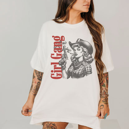 White t-shirt with graphic design and text worn by a person on a plain background