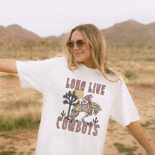 Oversized cowboy tee featuring a bold distressed design with western and rodeo elements. Vintage ranch tee perfect for fans of southwestern and rustic style. Nostalgic western graphic ideal for casual outfits and everyday comfort.