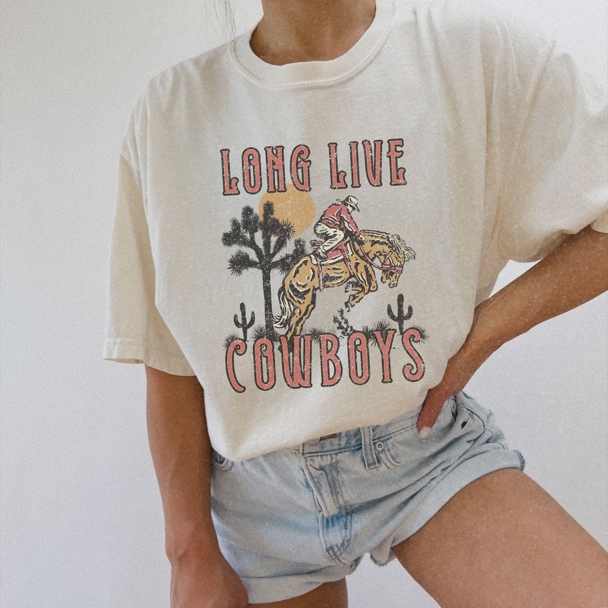 Oversized cowboy tee featuring a bold distressed design with western and rodeo elements. Vintage ranch tee perfect for fans of southwestern and rustic style. Nostalgic western graphic ideal for casual outfits and everyday comfort.