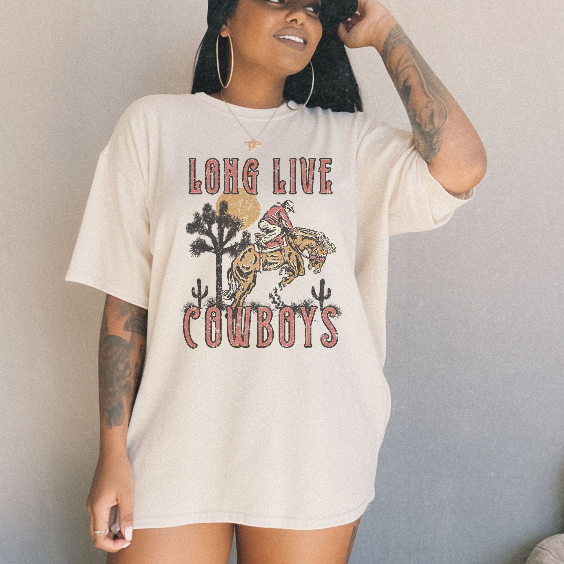Oversized cowboy tee featuring a bold distressed design with western and rodeo elements. Vintage ranch tee perfect for fans of southwestern and rustic style. Nostalgic western graphic ideal for casual outfits and everyday comfort.