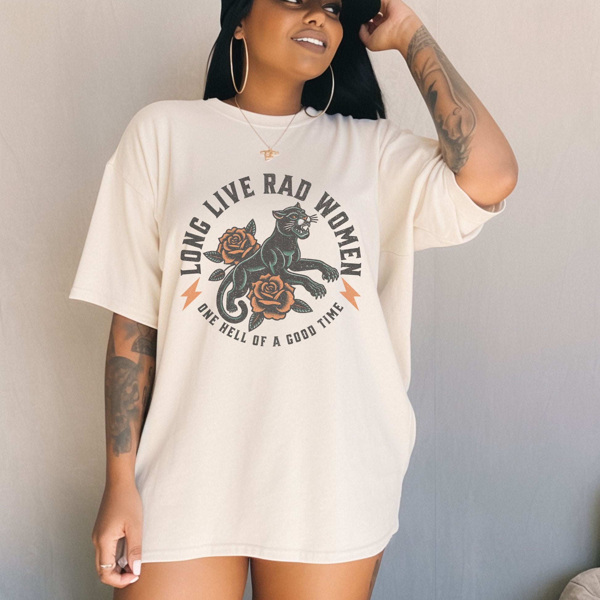 Rad women graphic tee with vintage panther and floral tattoo design. Feminist retro tee made for bold women and cool girls. Edgy graphic tee with panther crew style for rebel hearts. Powerful women tee perfect for everyday casual looks.