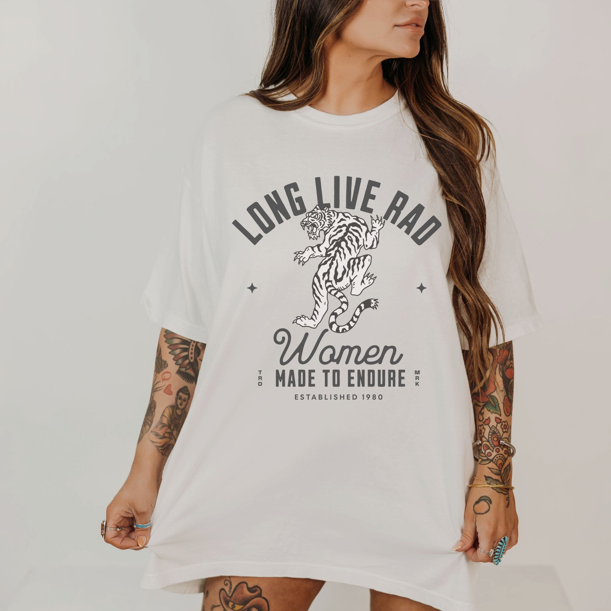 Rad Women Tee with vintage tiger graphic. 90s band graphic tee style with distressed rock tee aesthetic. Edgy women’s tee for a bold look. Western rock tee meets grunge style tee. Badass women tee with rebel graphic tee energy, perfect for everyday wear.