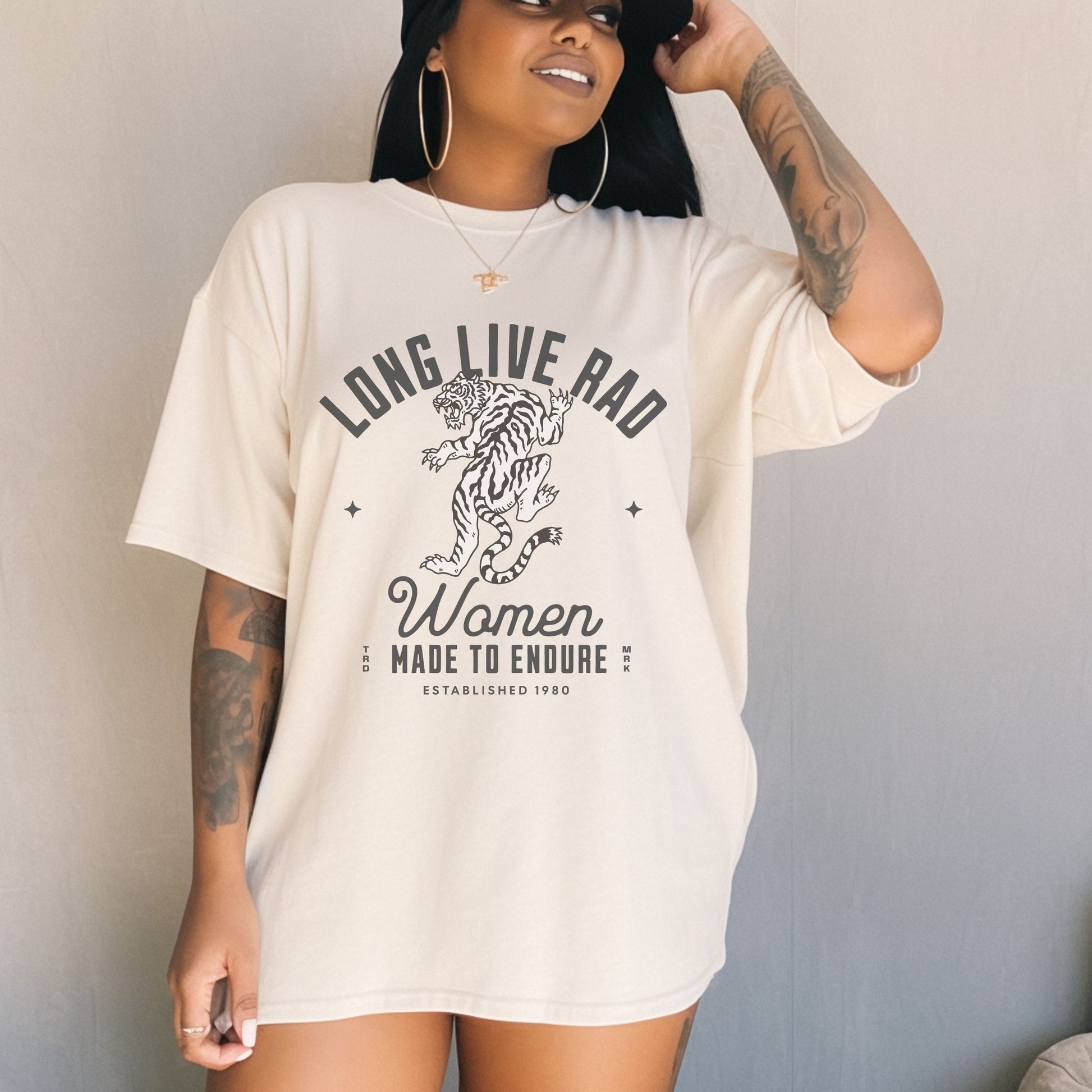 Rad Women Tee with vintage tiger graphic. 90s band graphic tee style with distressed rock tee aesthetic. Edgy women’s tee for a bold look. Western rock tee meets grunge style tee. Badass women tee with rebel graphic tee energy, perfect for everyday wear.
