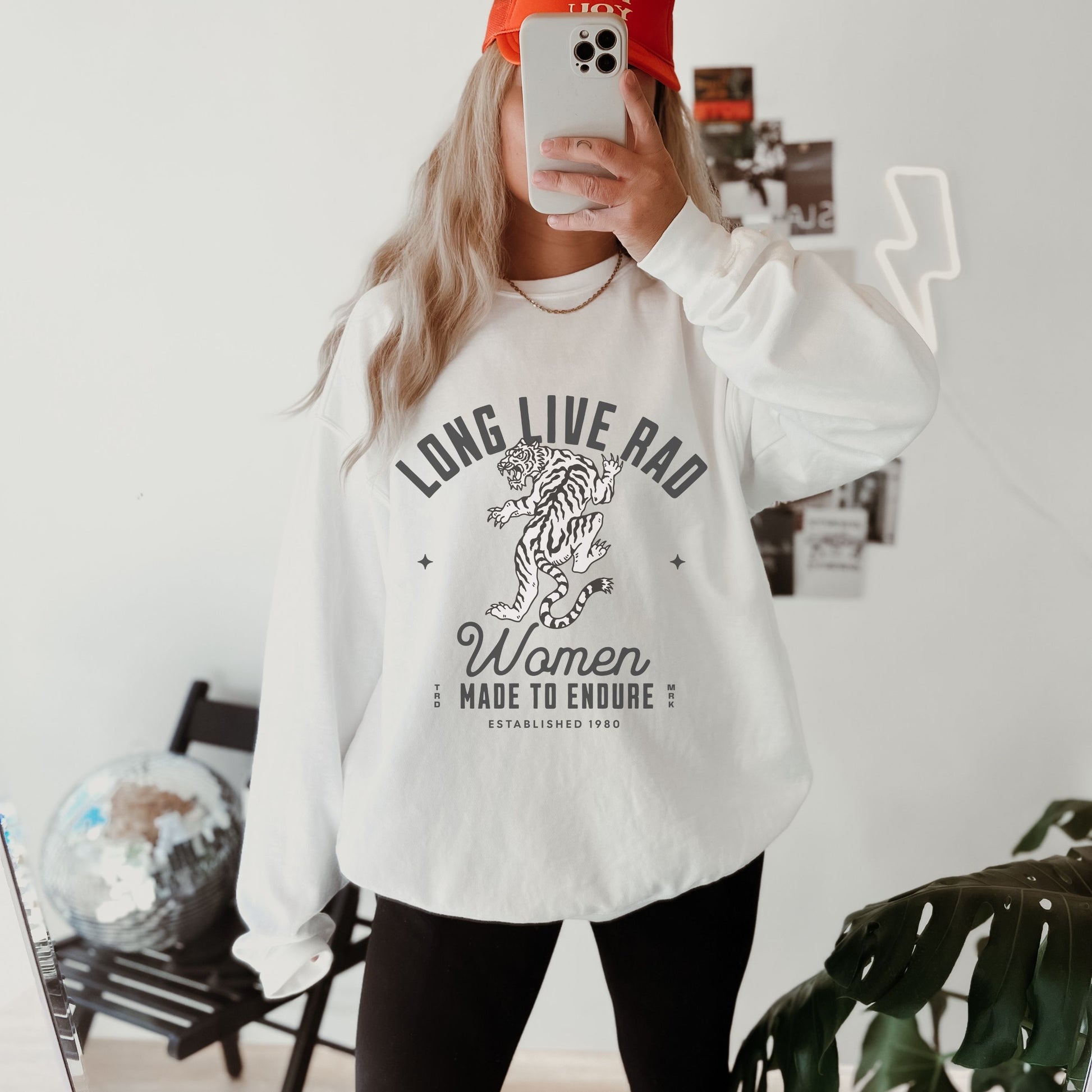 Rad Women Sweatshirt with tiger graphic. 90s aesthetic crew with vintage style. Edgy women’s crew with Western rock vibes. Distressed rock crew for a bold look. Badass women crew with rebel energy. Retro tiger crew, perfect for everyday wear and layering.