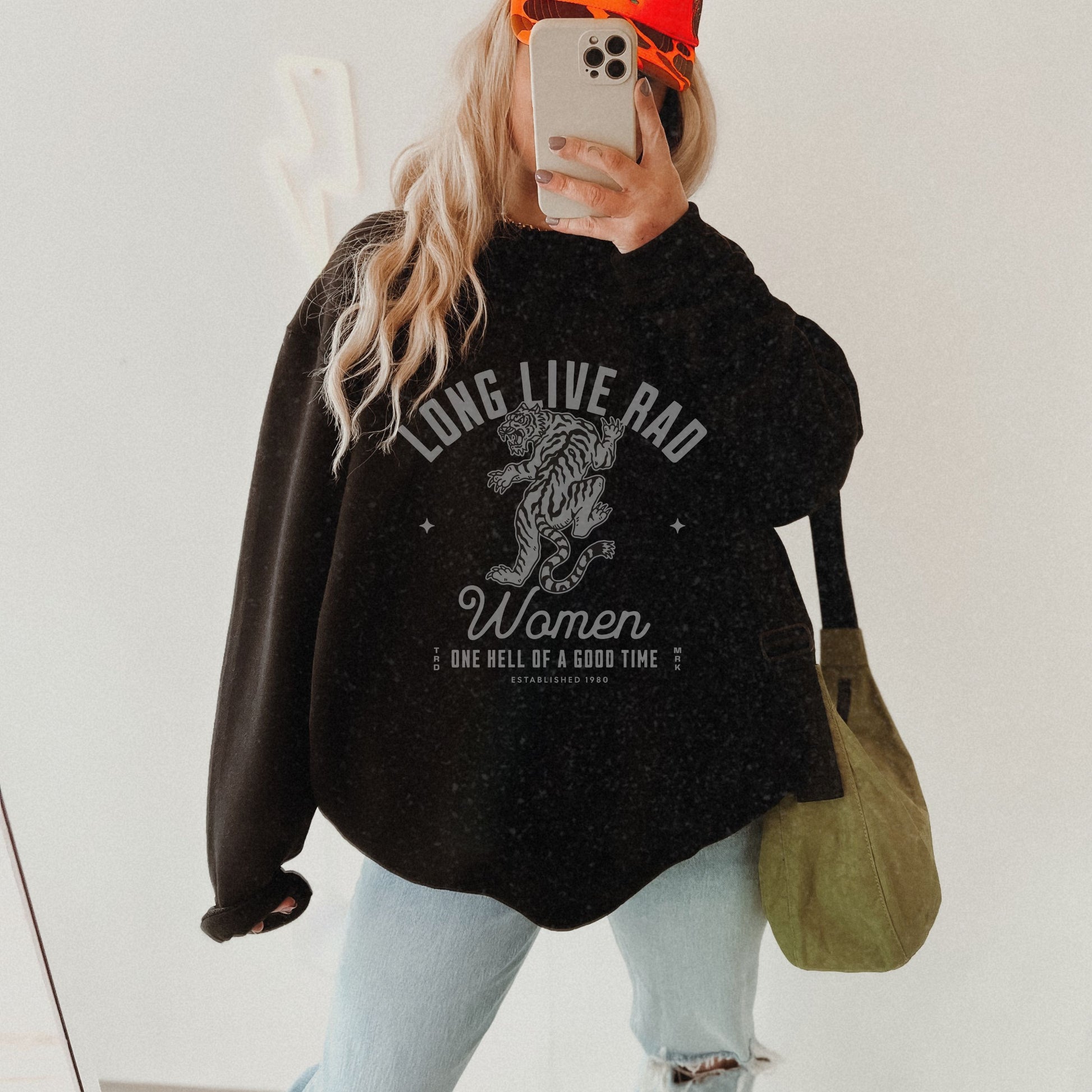 Rad Women Sweatshirt with tiger graphic. 90s aesthetic crew with vintage style. Edgy women’s crew with Western rock vibes. Distressed rock crew for a bold look. Badass women crew with rebel energy. Retro tiger crew, perfect for everyday wear and layering.