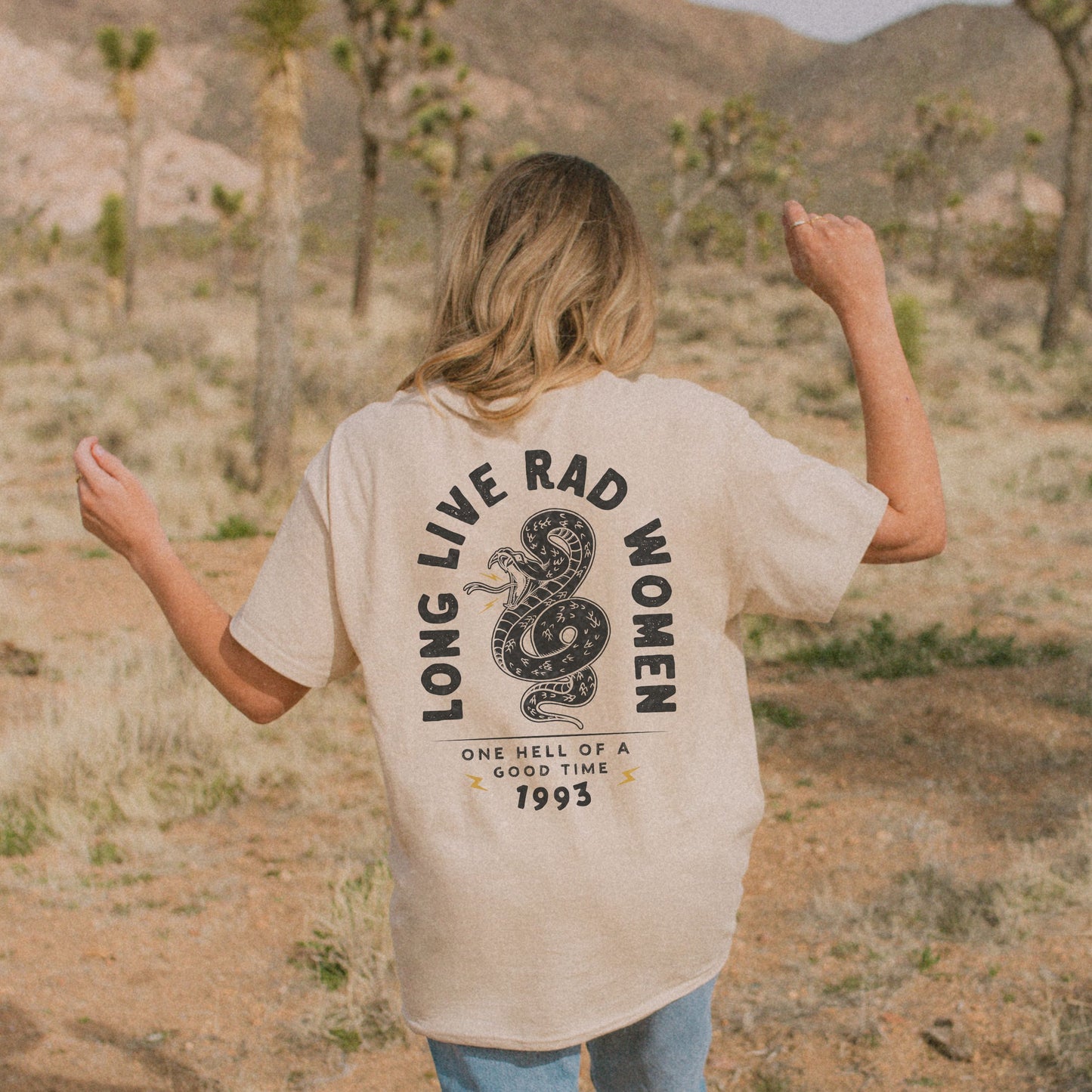 Long Live Rad Women retro snake tee, vintage cotton shirt with relaxed fit, feminist graphic tee, statement graphic tee, snake design tee, lightweight casual cotton tee, bold feminist shirt, 90s style t-shirt, graphic women tee for everyday wear.