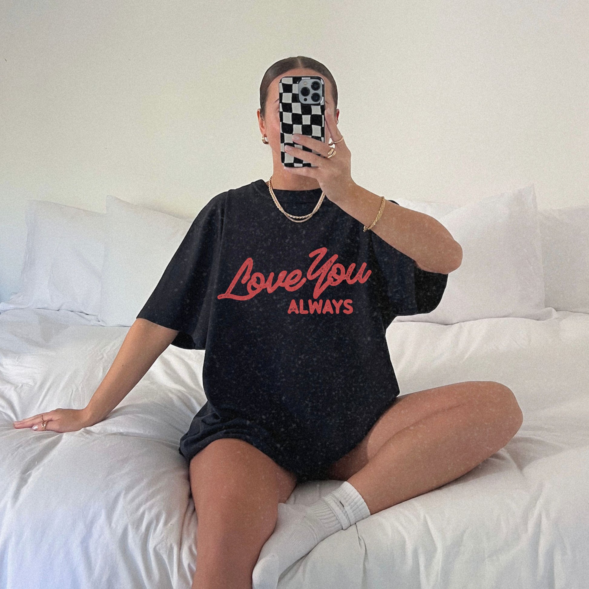 Love You Always graphic t-shirt in multiple colors, featuring bold red script text on a minimalist design. Perfect for Valentine’s Day, anniversaries, or everyday wear.