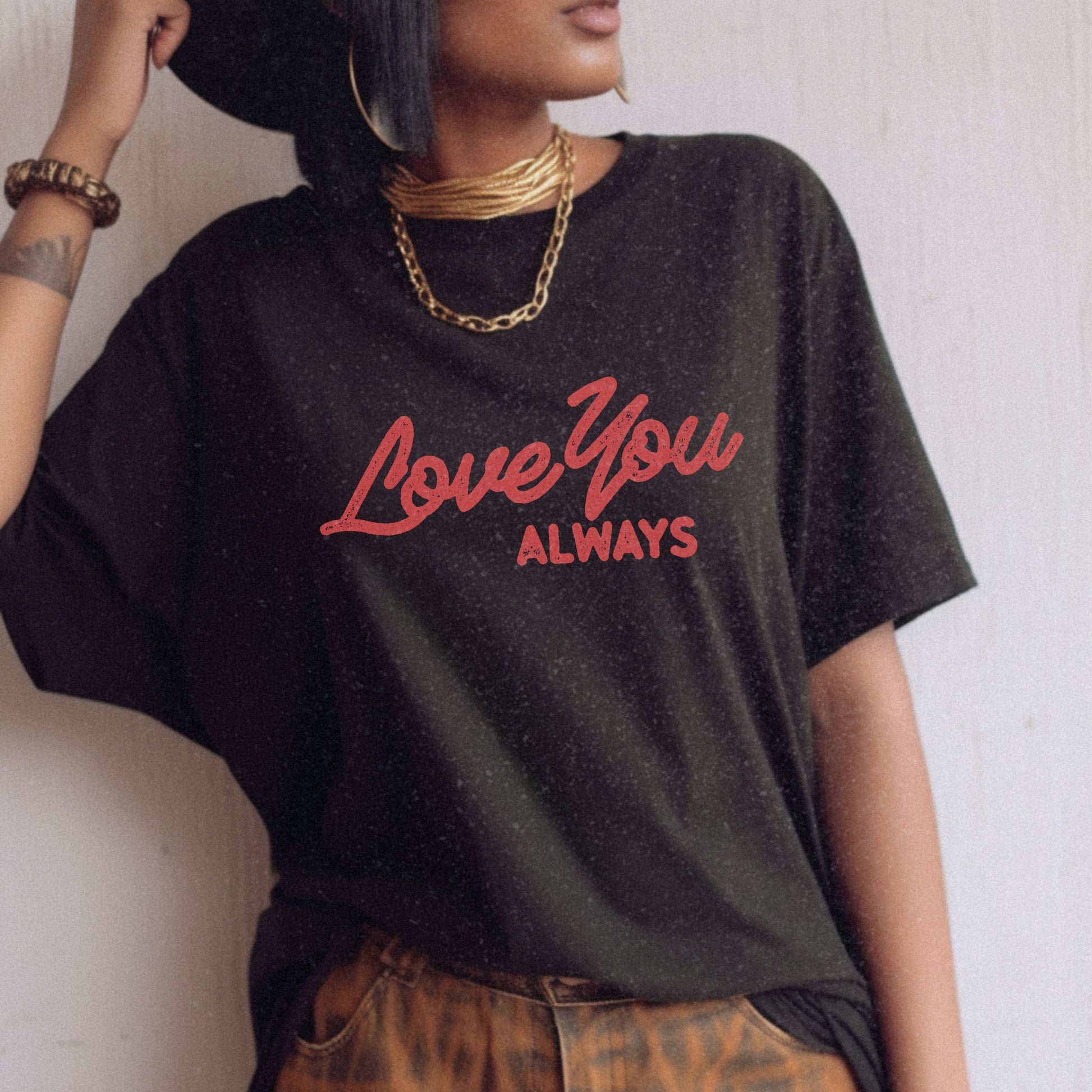 Love You Always graphic t-shirt in multiple colors, featuring bold red script text on a minimalist design. Perfect for Valentine’s Day, anniversaries, or everyday wear.