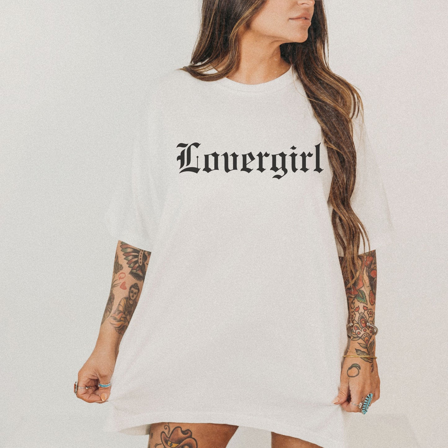 Vintage lovergirl tee in black with old English text font. Oversized casual fit perfect as a retro aesthetic shirt or edgy women’s graphic tee. Soft cotton black tee for everyday wear, combining minimalist style with trendy retro t-shirt vibes.