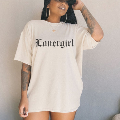 Vintage lovergirl tee in black with old English text font. Oversized casual fit perfect as a retro aesthetic shirt or edgy women’s graphic tee. Soft cotton black tee for everyday wear, combining minimalist style with trendy retro t-shirt vibes.