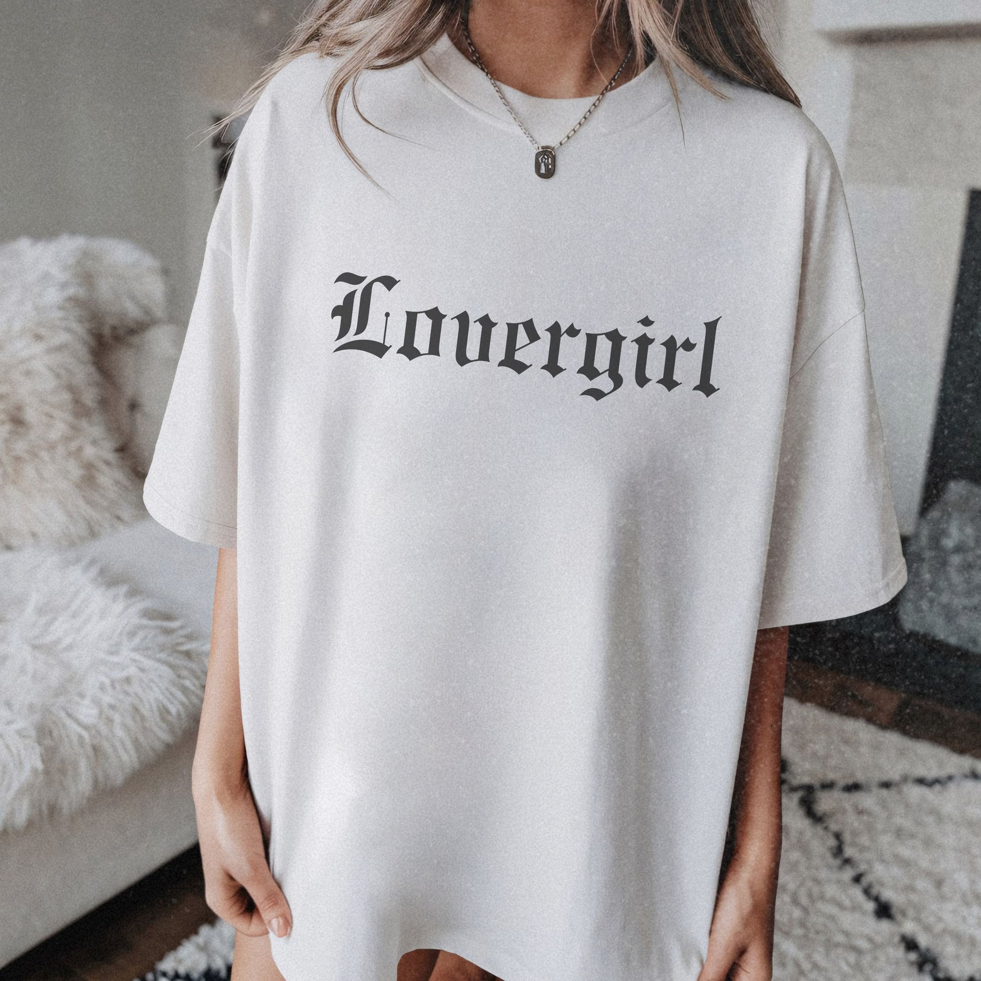 Vintage lovergirl tee in black with old English text font. Oversized casual fit perfect as a retro aesthetic shirt or edgy women’s graphic tee. Soft cotton black tee for everyday wear, combining minimalist style with trendy retro t-shirt vibes.