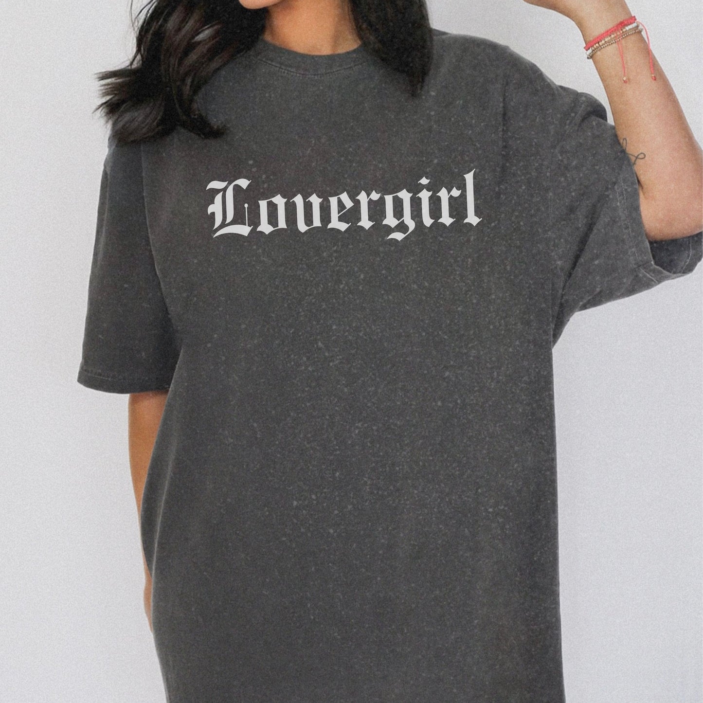 Vintage lovergirl tee in black with old English text font. Oversized casual fit perfect as a retro aesthetic shirt or edgy women’s graphic tee. Soft cotton black tee for everyday wear, combining minimalist style with trendy retro t-shirt vibes.