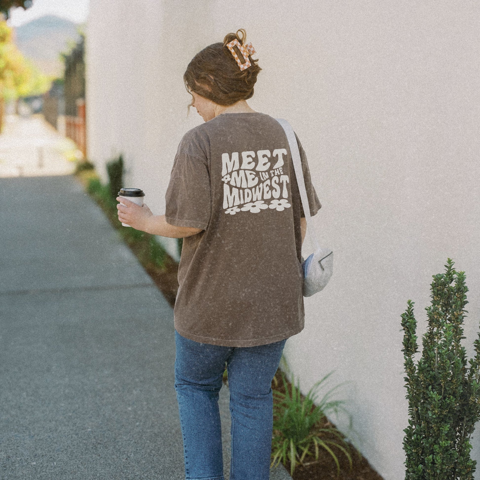 Retro Midwest shirt with bold floral graphic design and "Meet Me in the Midwest" text. Perfect for casual outfits, Midwest road trips, or trendy Midwest looks, combining comfort and style effortlessly. 