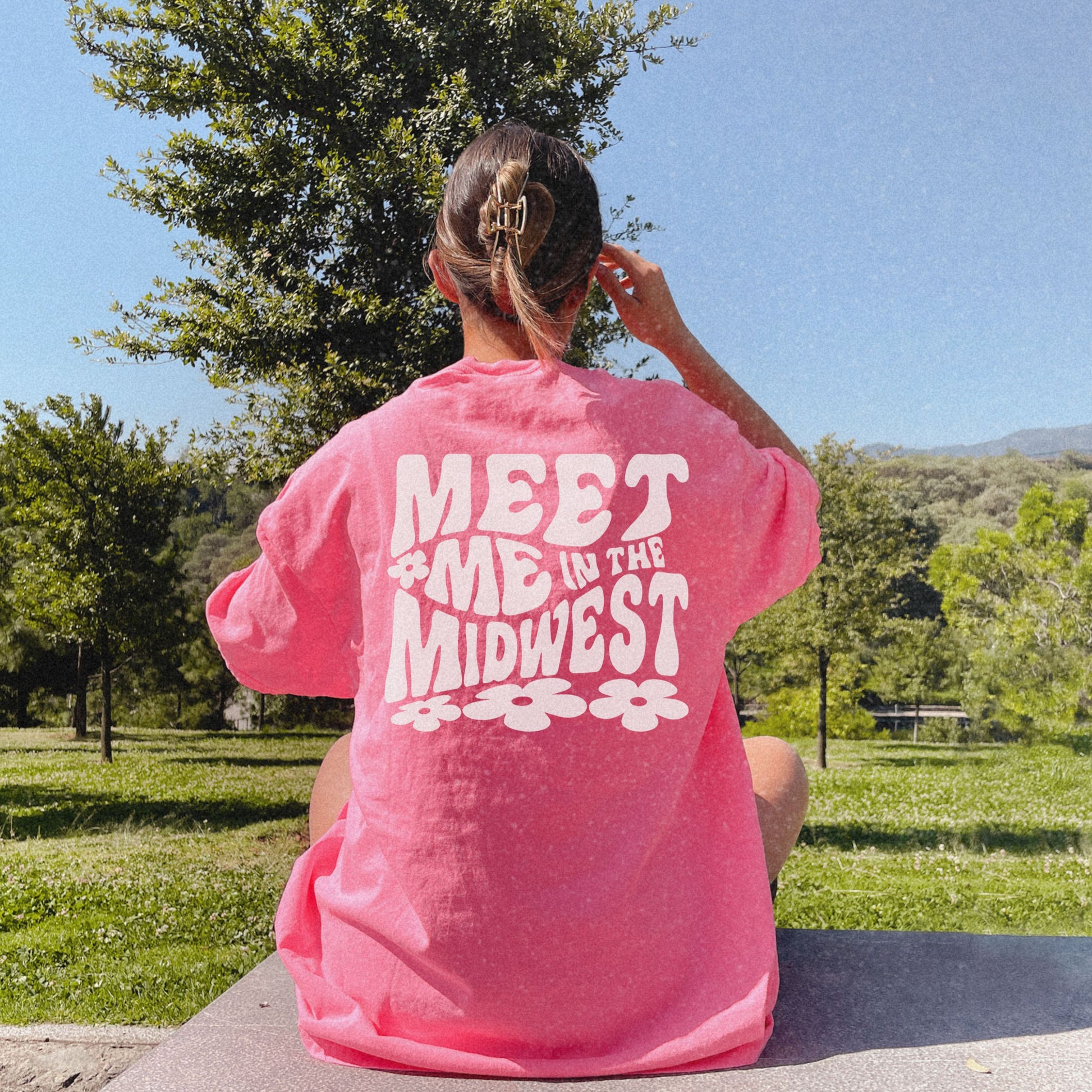 Retro Midwest shirt with bold floral graphic design and "Meet Me in the Midwest" text. Perfect for casual outfits, Midwest road trips, or trendy Midwest looks, combining comfort and style effortlessly. 