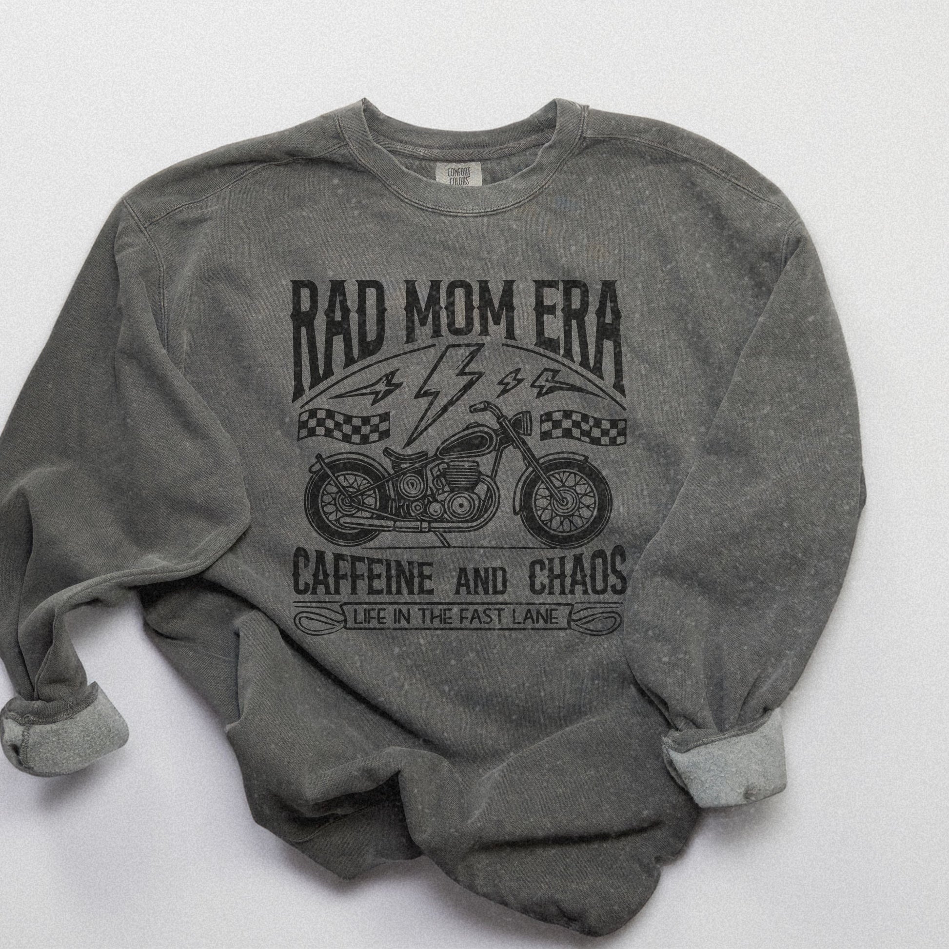 Rad mom graphic tee featuring a vintage motorcycle design with bold text. Perfect for edgy mom style, this trendy mom sweatshirt embodies caffeine chaos vibes and retro mom life. Great for biker moms or stylish moms seeking a casual yet bold look.