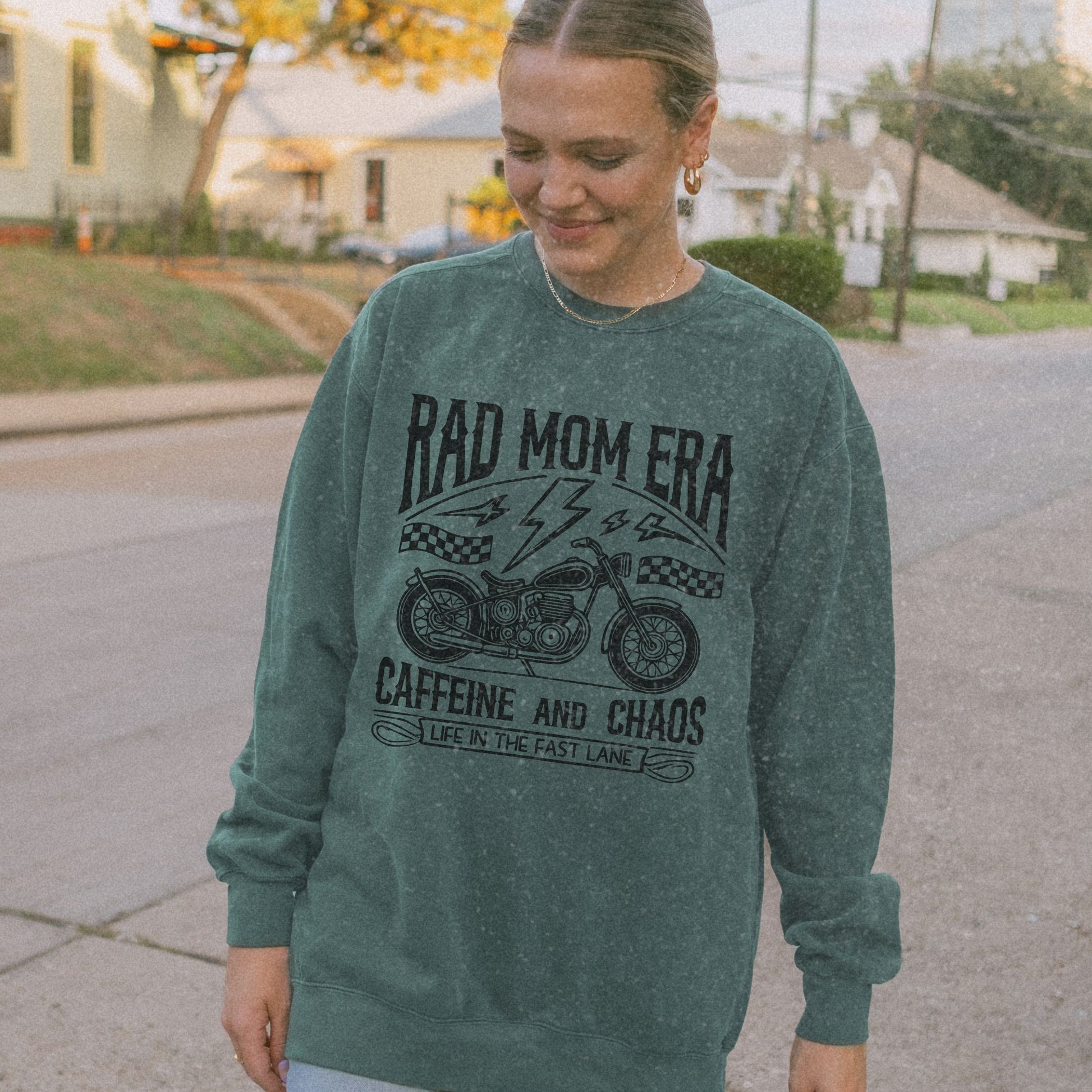 Rad mom graphic tee featuring a vintage motorcycle design with bold text. Perfect for edgy mom style, this trendy mom sweatshirt embodies caffeine chaos vibes and retro mom life. Great for biker moms or stylish moms seeking a casual yet bold look.