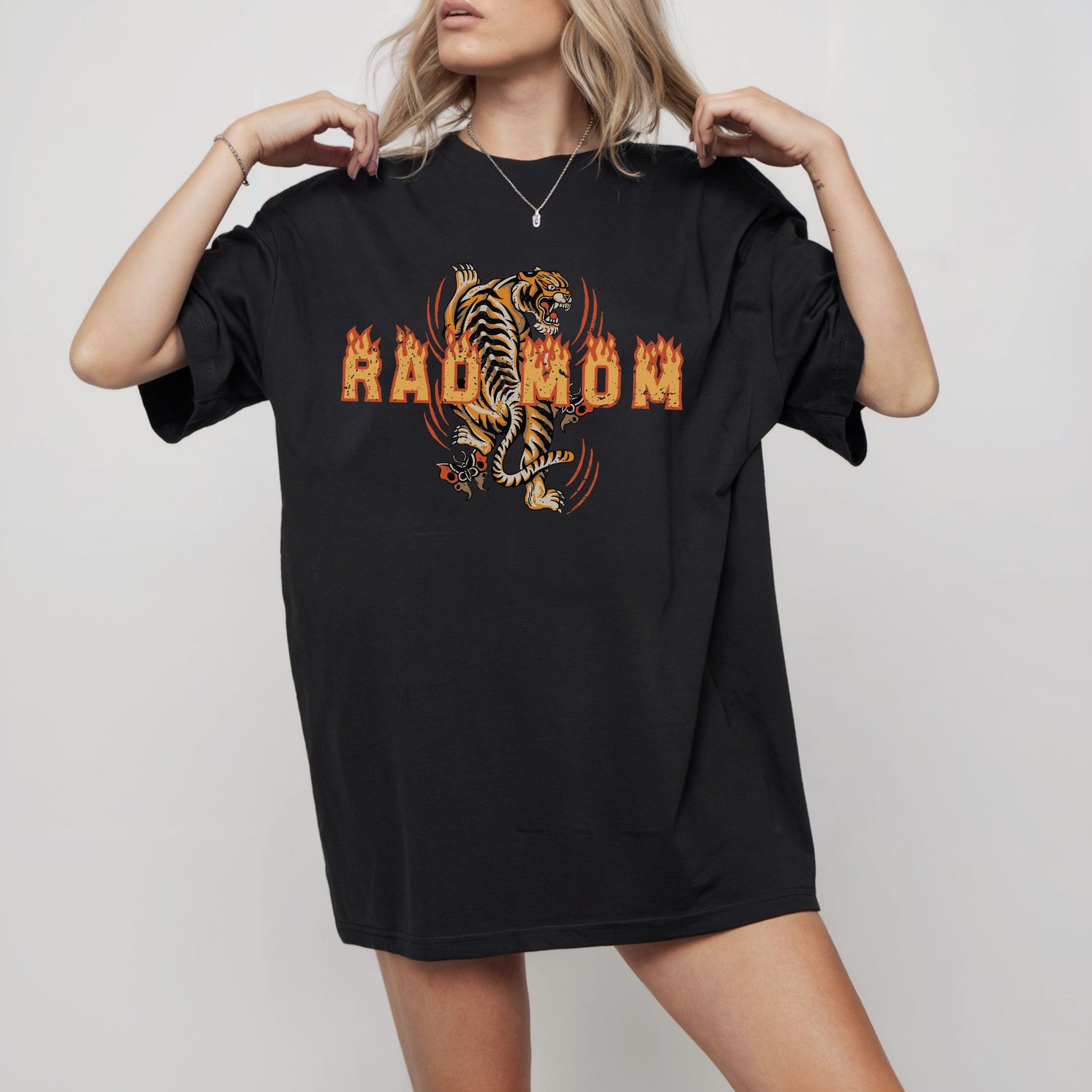 Rad mom graphic tee featuring bold vintage tiger design with flame details. Cool mom streetwear shirt with retro tattoo style graphic perfect for everyday edgy mom style and bold vintage inspired streetwear.