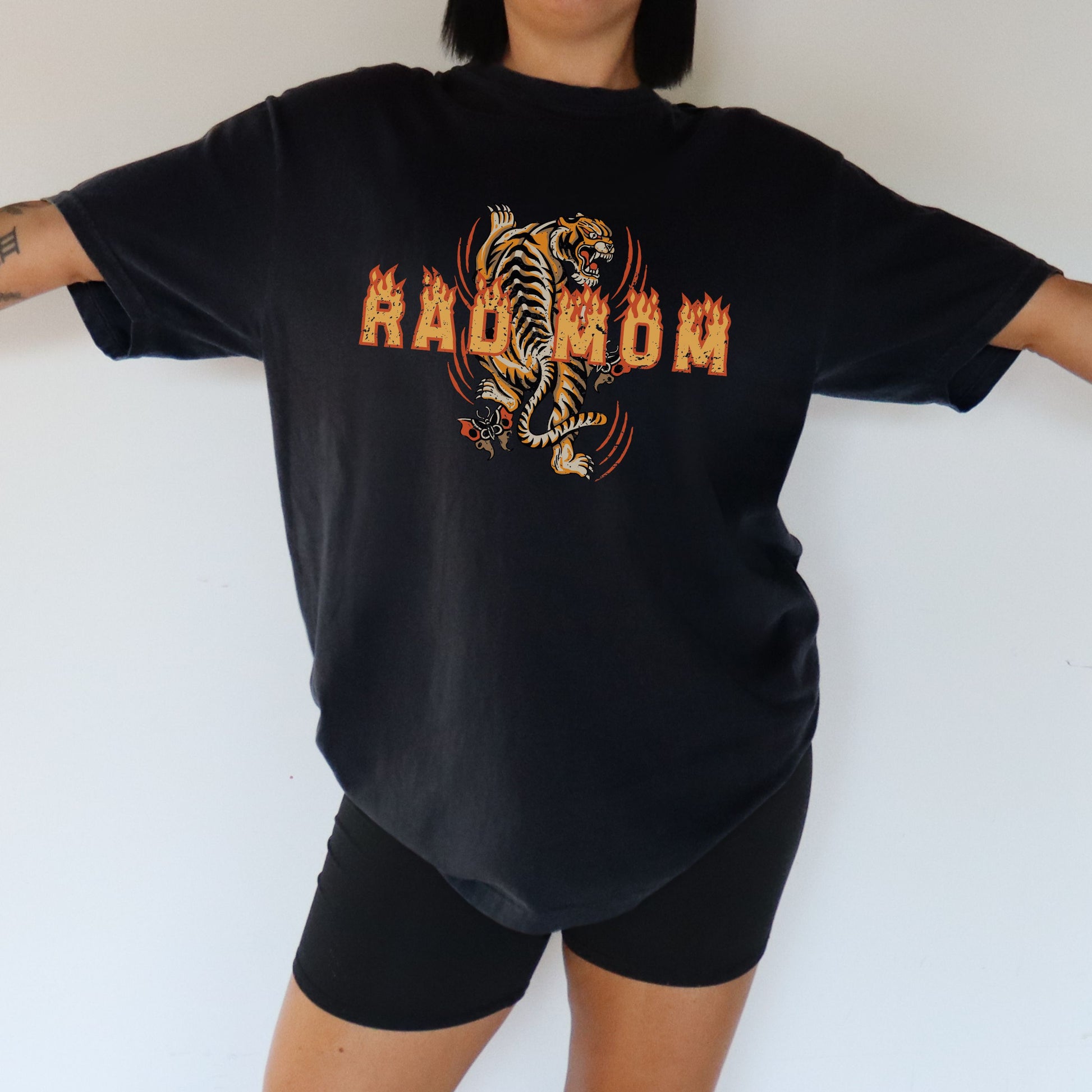 Rad mom graphic tee featuring bold vintage tiger design with flame details. Cool mom streetwear shirt with retro tattoo style graphic perfect for everyday edgy mom style and bold vintage inspired streetwear.