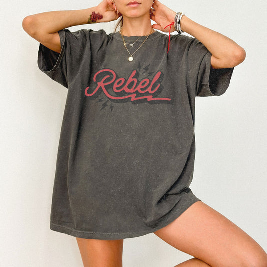 Retro Rebel Tee with vintage-inspired graphic and lightning bolt design. Oversized Rebel Tee perfect for streetwear or casual looks. Distressed Rebel Tee for 90s vibes. Bold Rebel Graphic Tee for a statement style. Ideal for everyday wear with a cool edge.