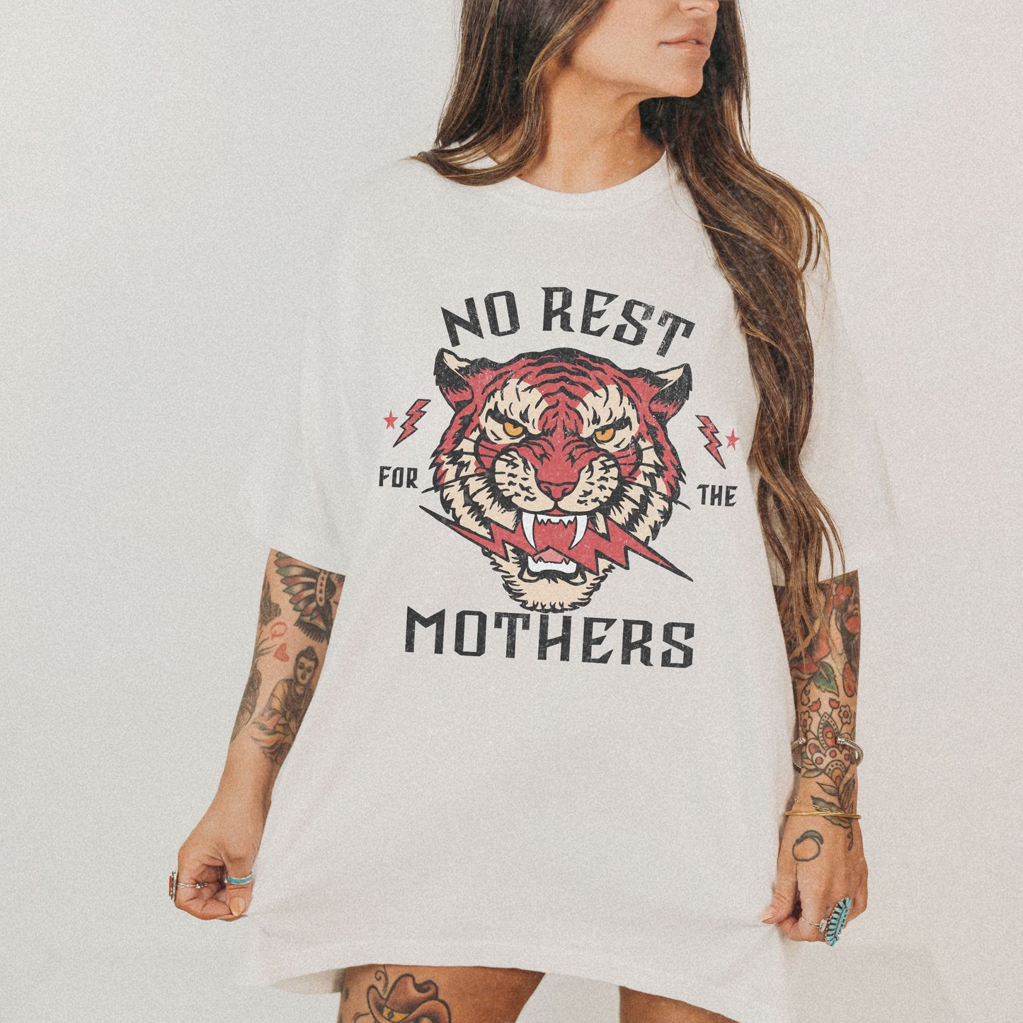 Bold tiger graphic on a No Rest for Mothers Tee, designed for empowered moms. This Tiger Mom Graphic Tee and Vintage Mom Graphic Tee combines retro flair with edgy style. Perfect for casual wear, gifting, or embracing mom life with confidence.