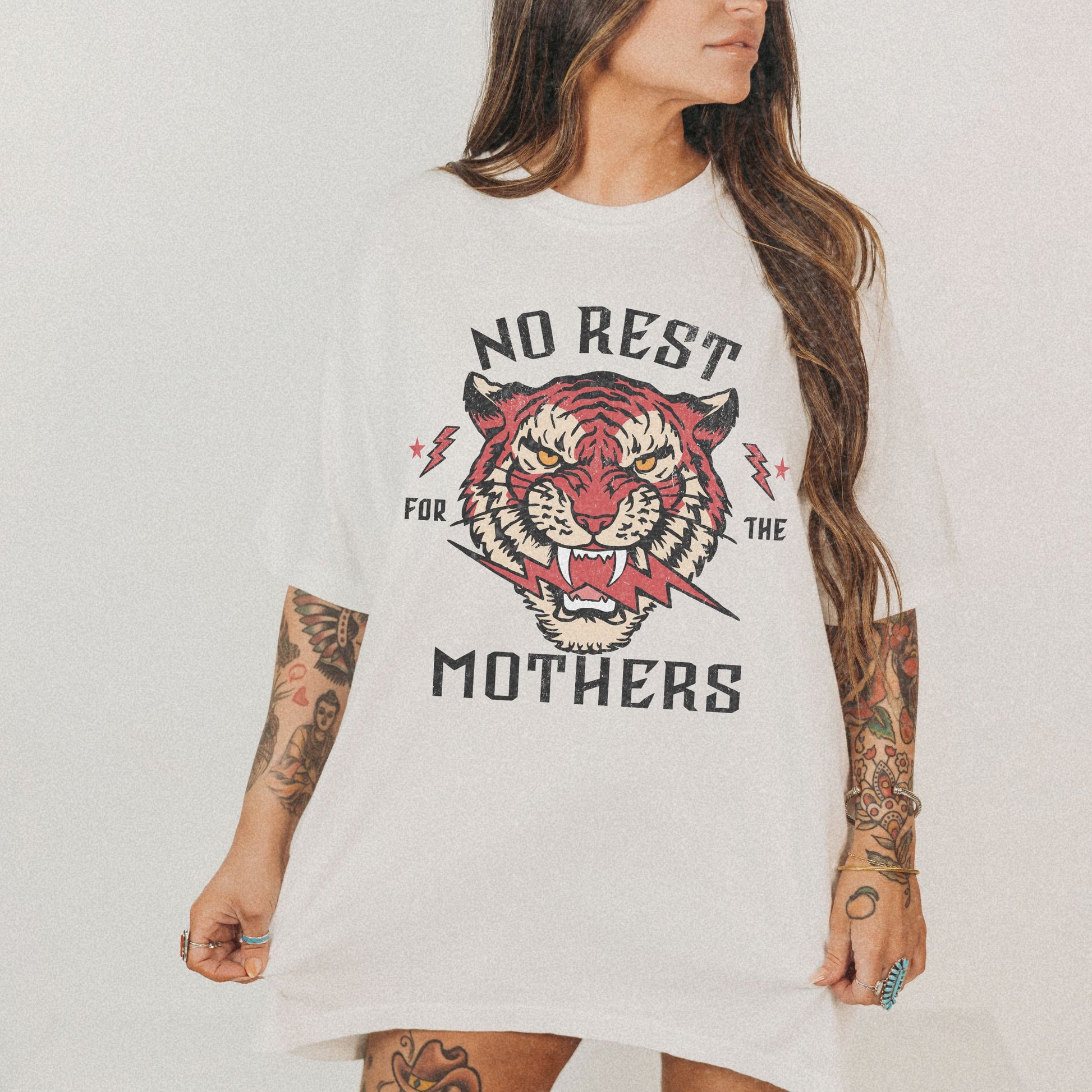 Bold tiger graphic on a No Rest for Mothers Tee, designed for empowered moms. This Tiger Mom Graphic Tee and Vintage Mom Graphic Tee combines retro flair with edgy style. Perfect for casual wear, gifting, or embracing mom life with confidence.