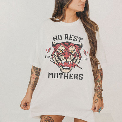 Bold tiger graphic on a No Rest for Mothers Tee, designed for empowered moms. This Tiger Mom Graphic Tee and Vintage Mom Graphic Tee combines retro flair with edgy style. Perfect for casual wear, gifting, or embracing mom life with confidence.